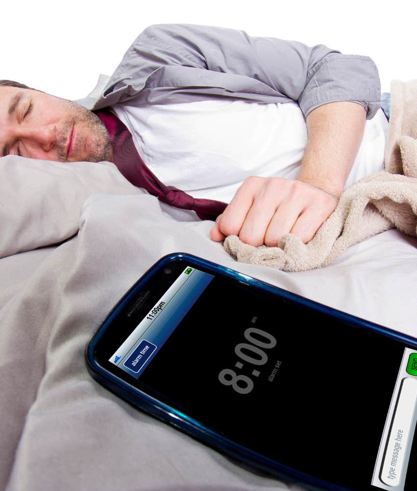 man sleeping through alarm