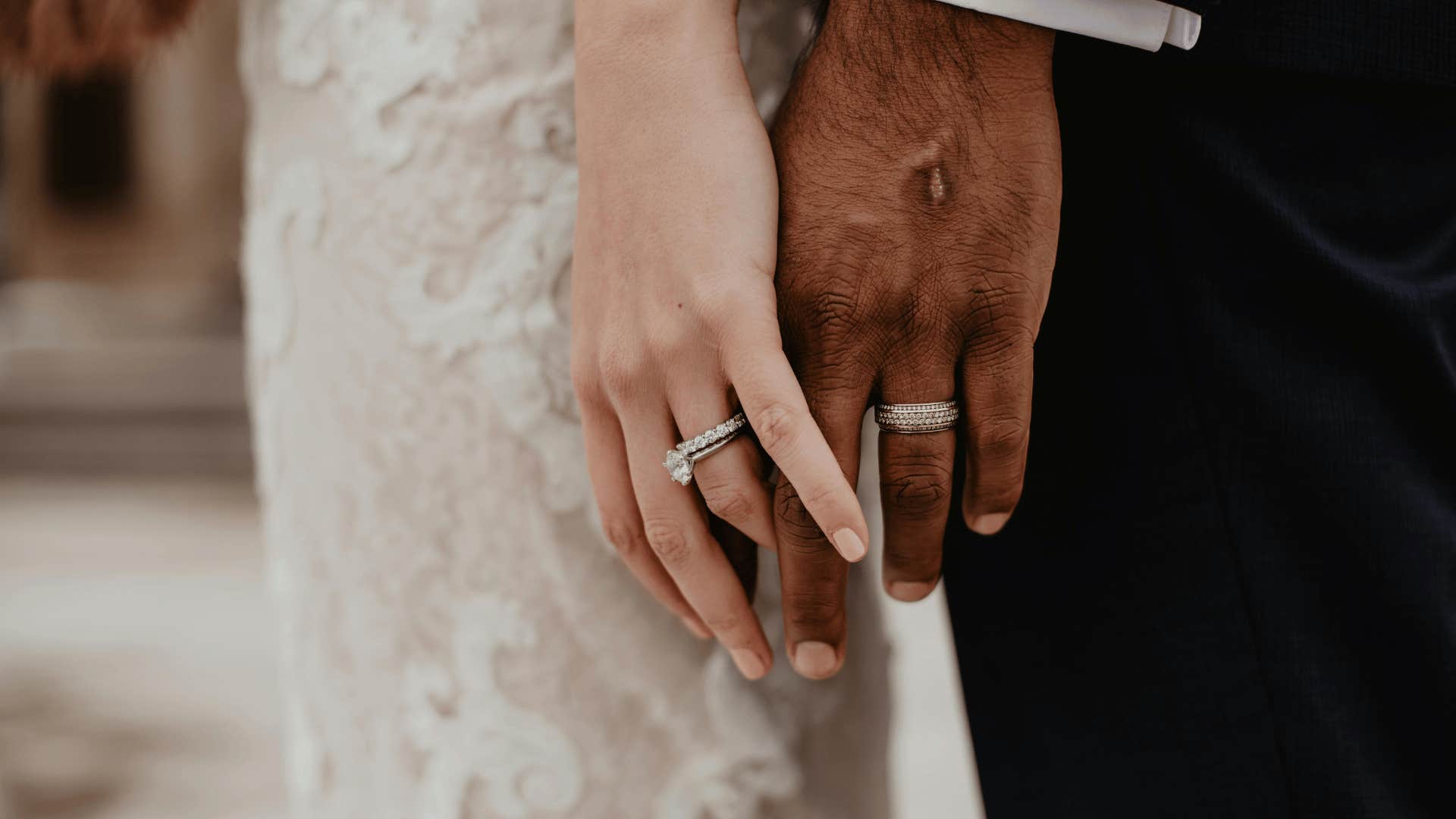 man and woman holding hands