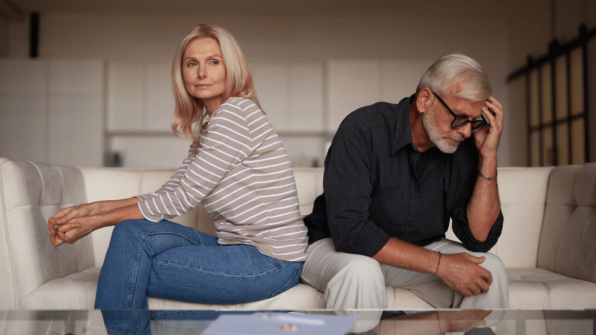 Boomer couple sit perpendicular to each other to sweep problem under the rug