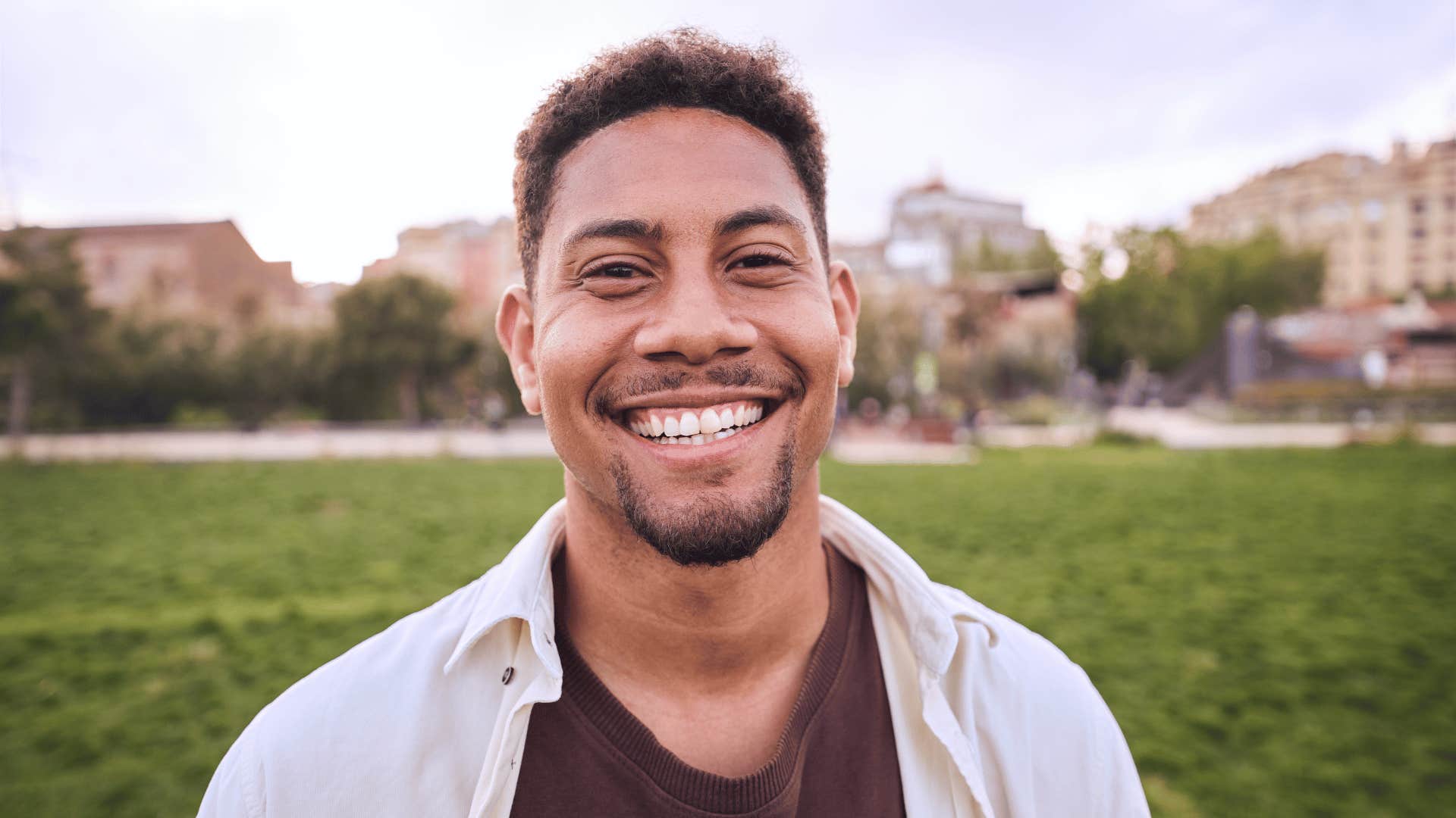 Smiling man in park