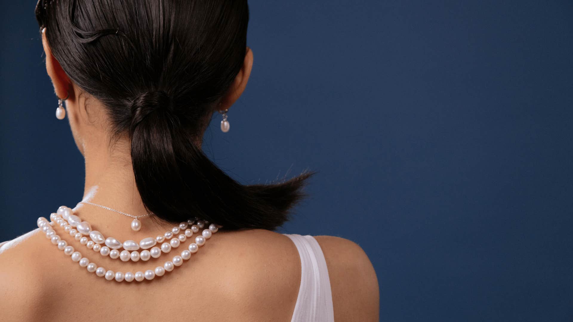 woman with pearls on