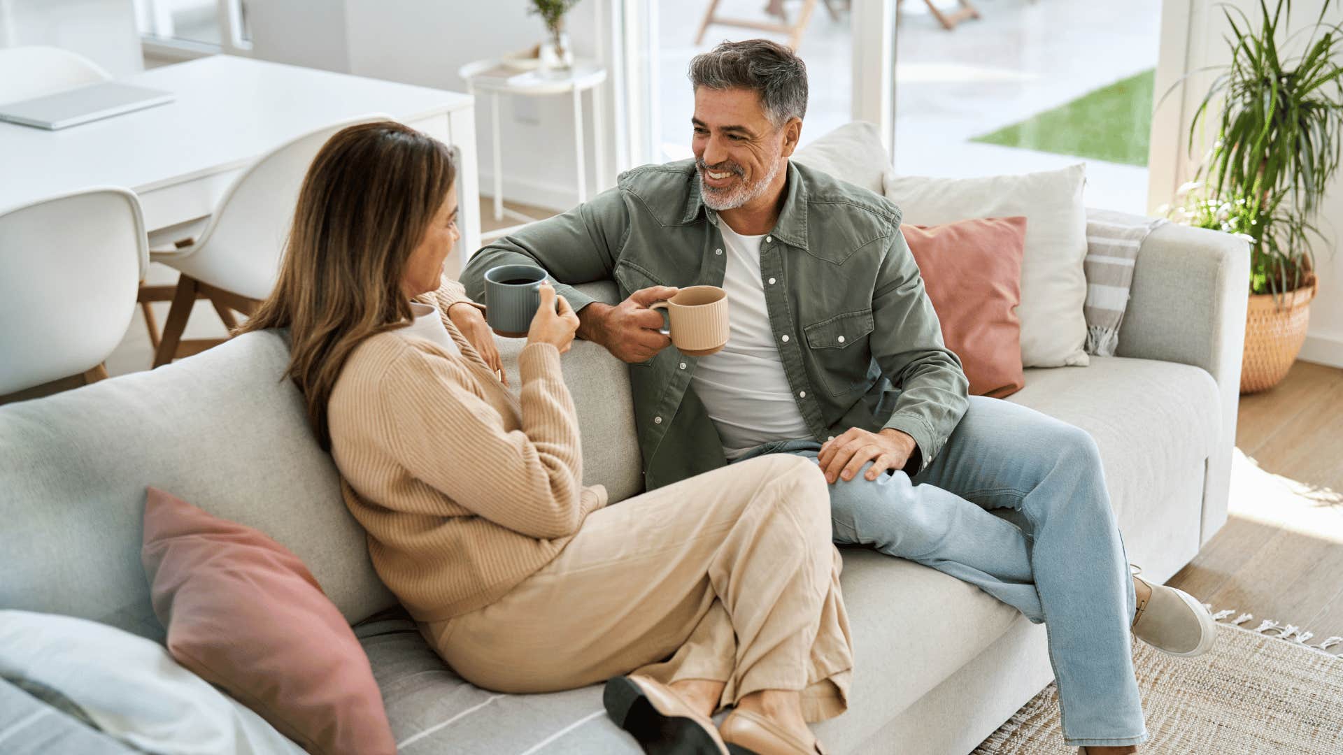 couple talking on couch