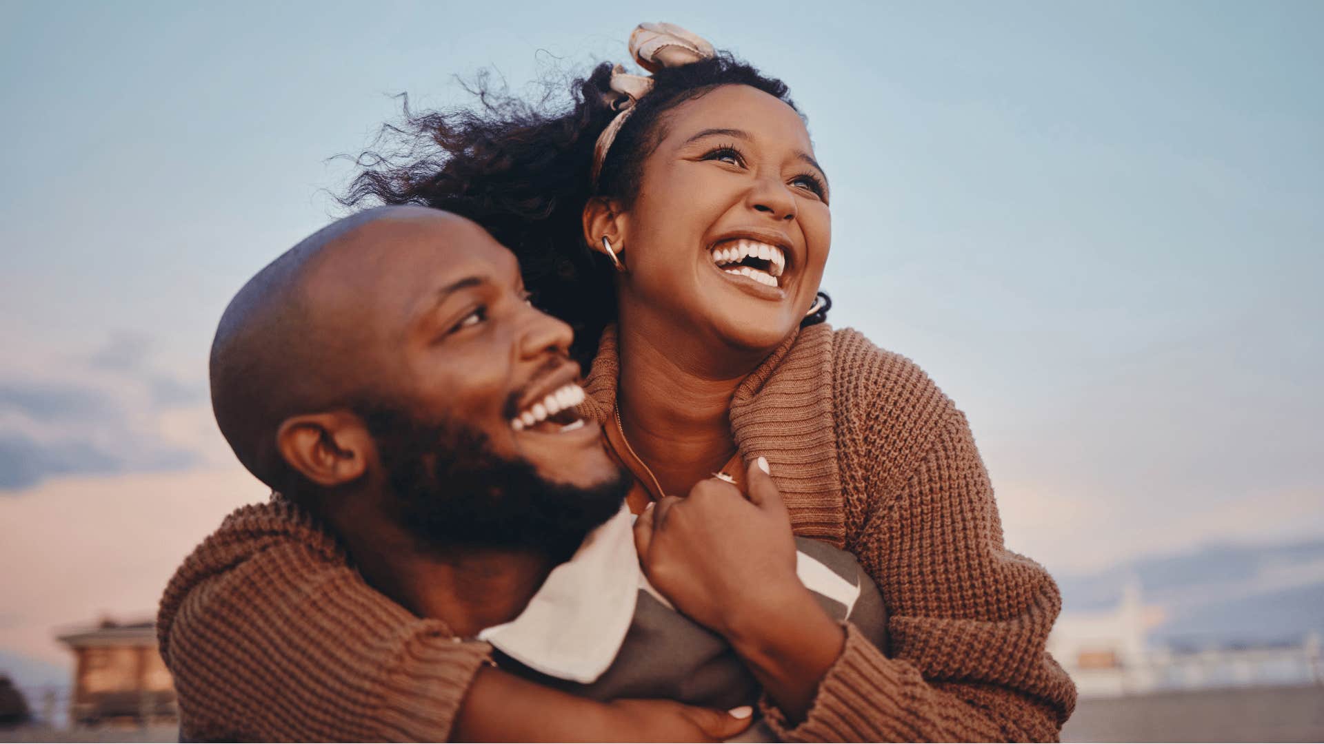 woman on man's back