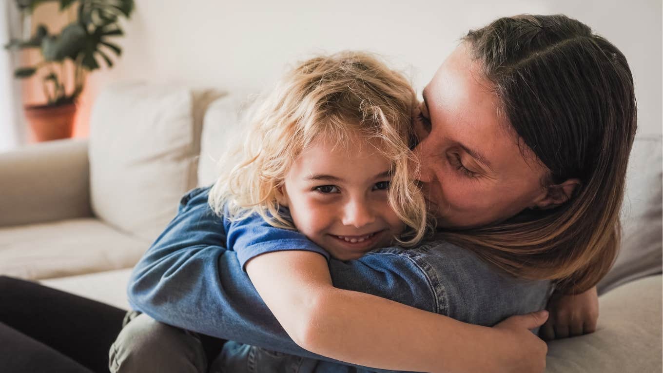 Mom hugs child before going to extreme therapy 