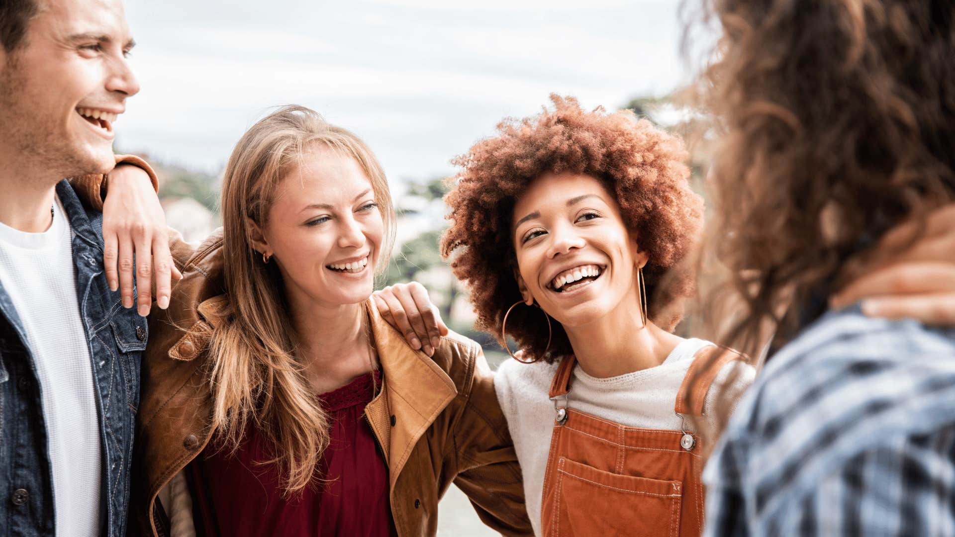 Group of millennials smile and trust each other