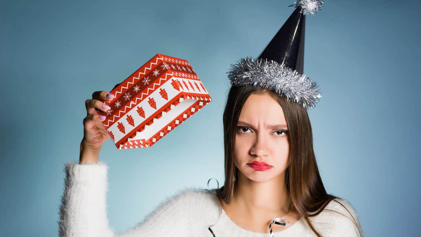 young woman upset about not receiving Christmas gifts