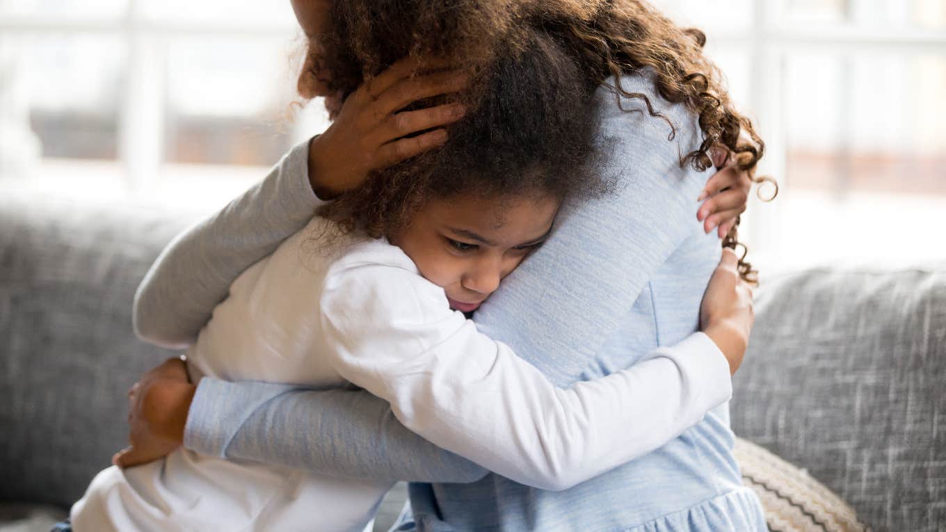 Mom hugging her stressed kid