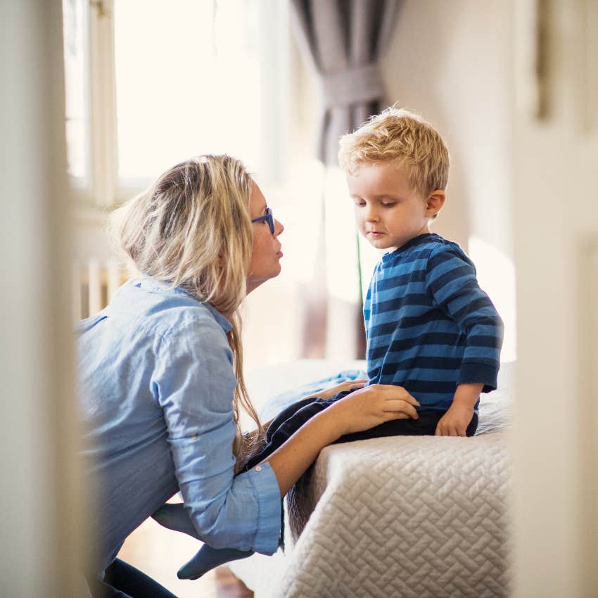 Mom talking to her young son