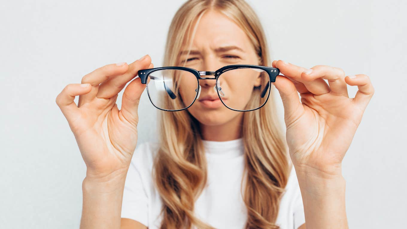 Woman with poor vision squinting