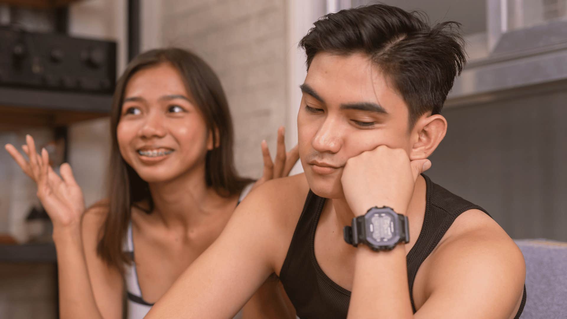 Man holds in his thoughts as woman talks about never fighting