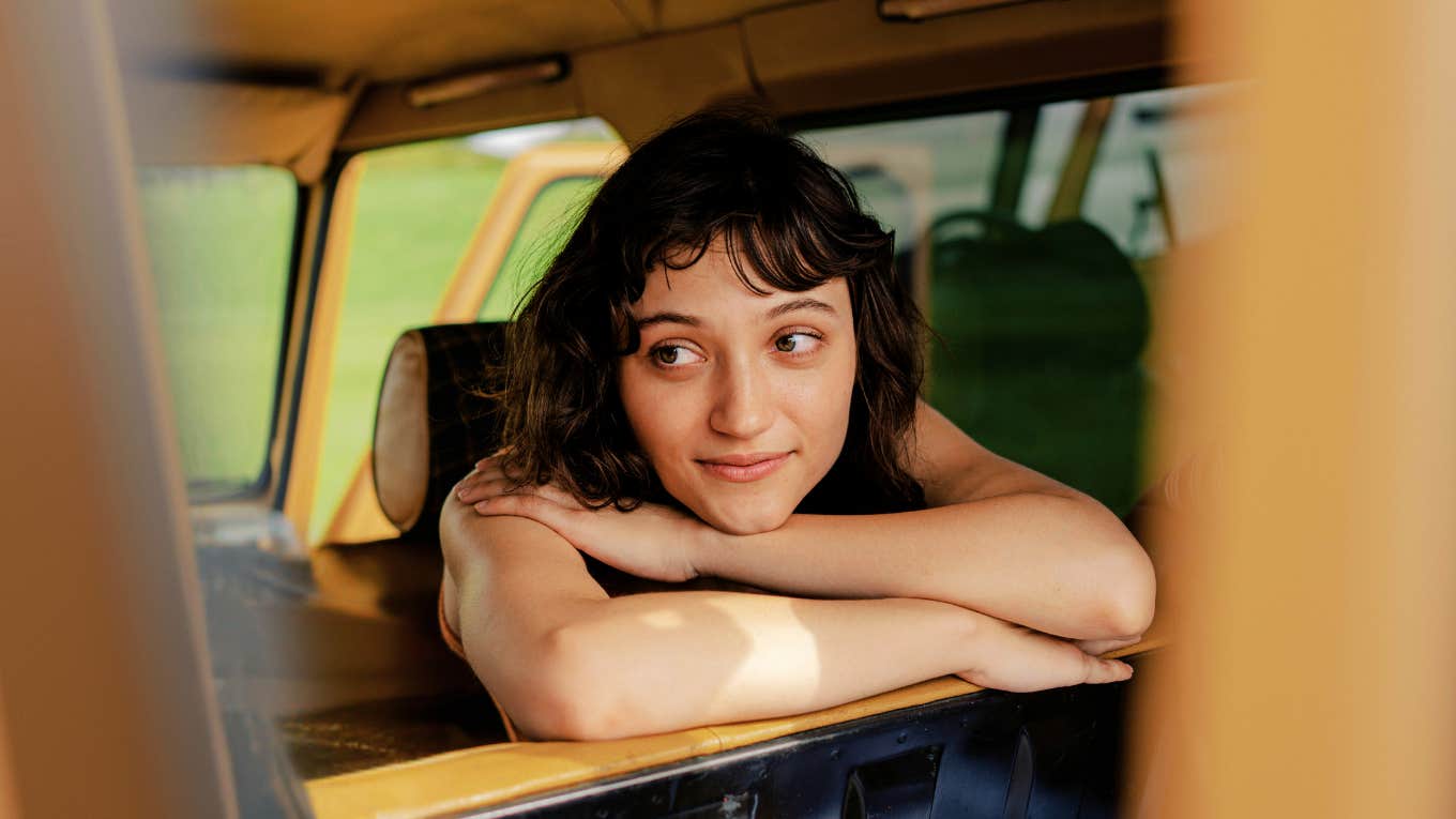 Emotional woman, resilently looking around her surroundings. 