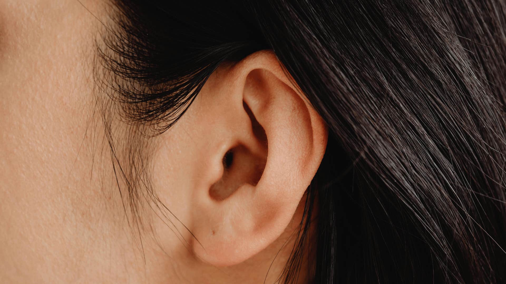 close up of woman's ear