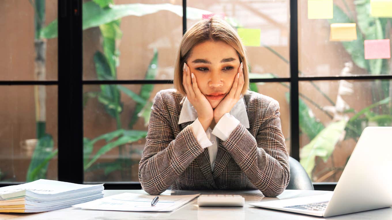 Woman sick at work.