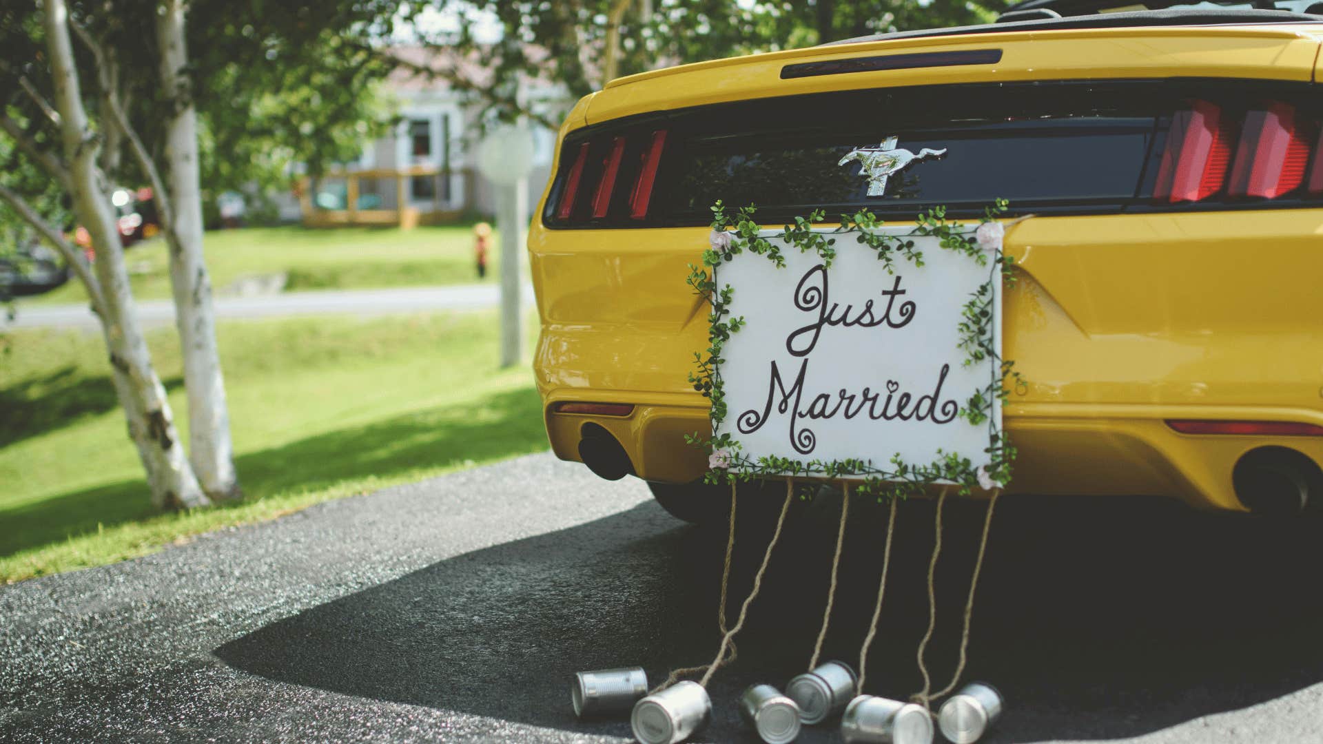 just married sign on the back of a car