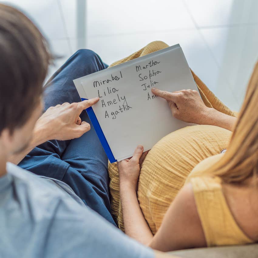 Expectant parents choosing their baby name