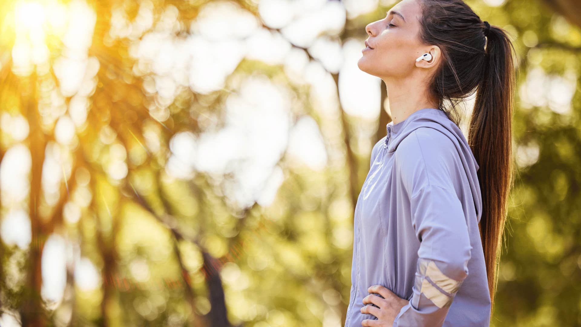 woman outside breathing in the air