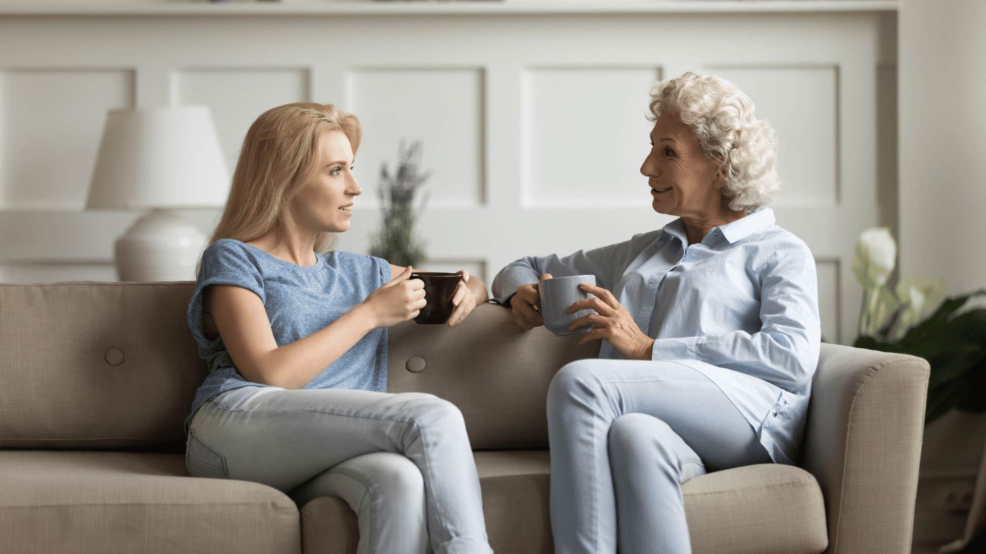 younger woman talking to older woman