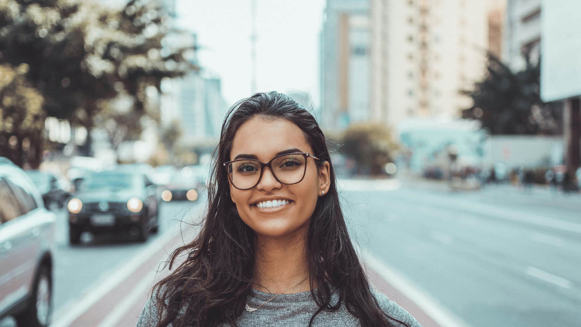 woman smiling in street