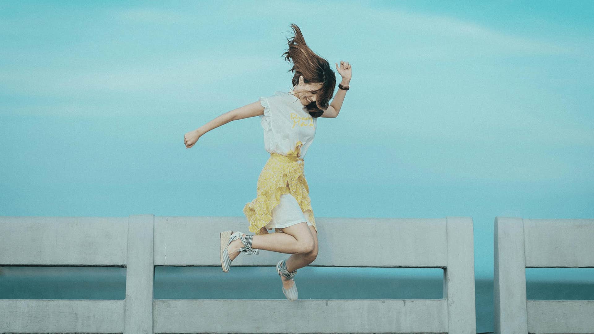 woman jumping in the air