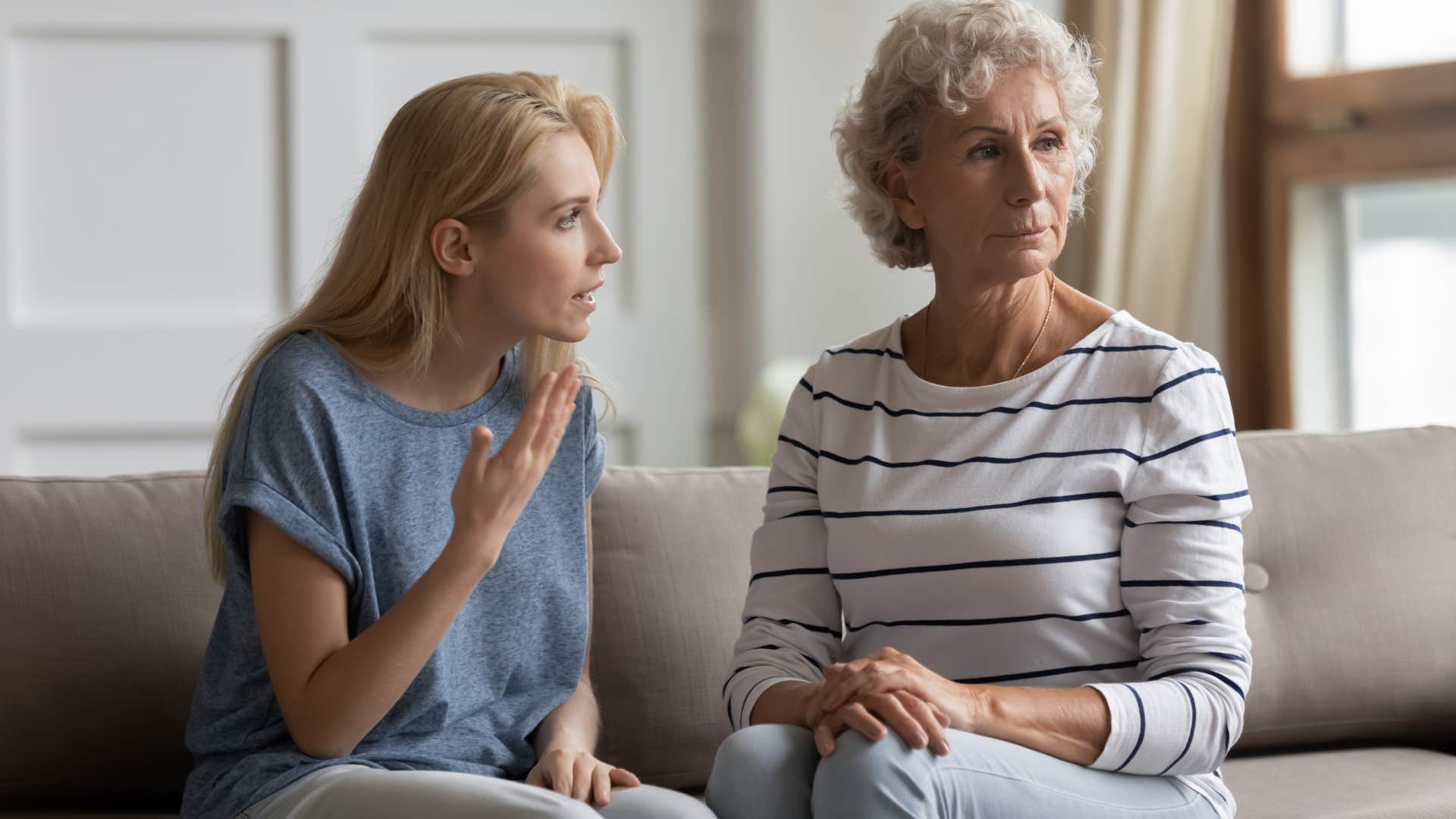 Woman arguing with her upset mother.