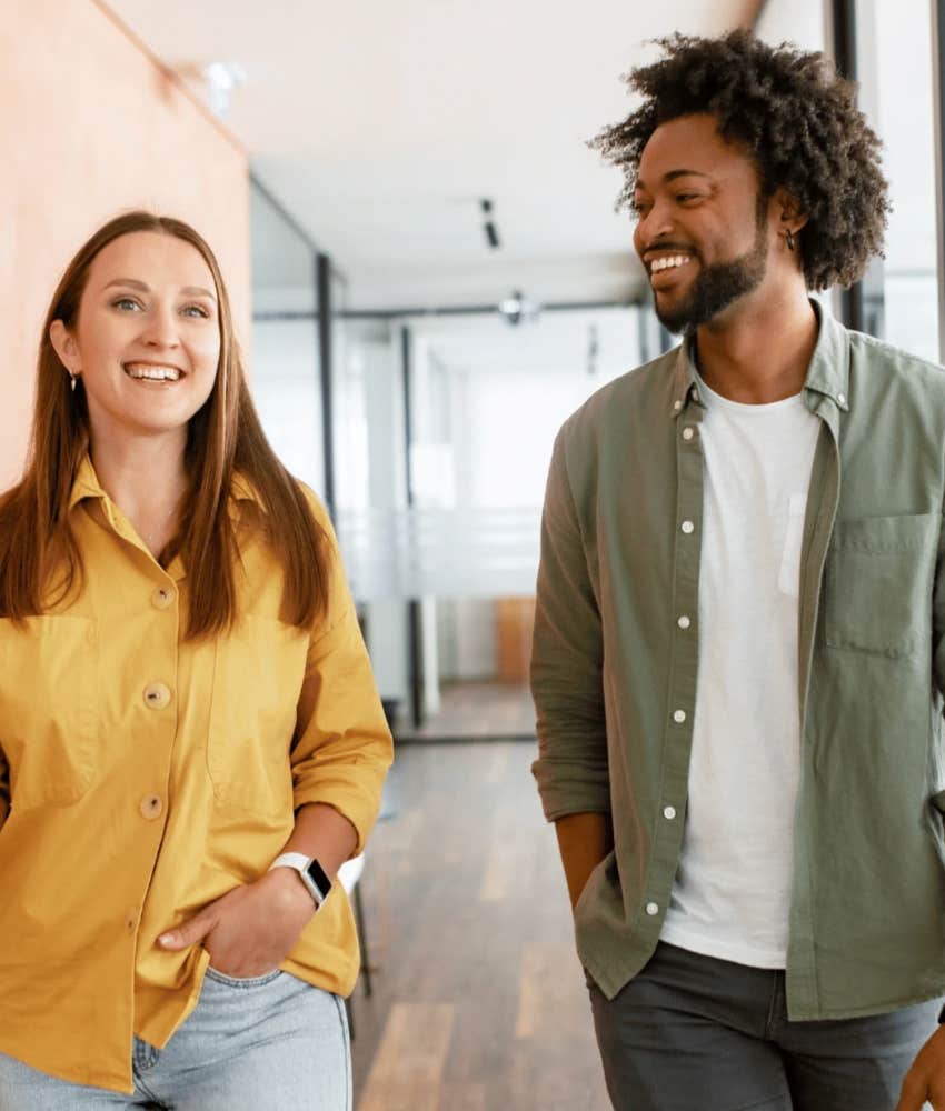 Exes who are friends, walking down a hall