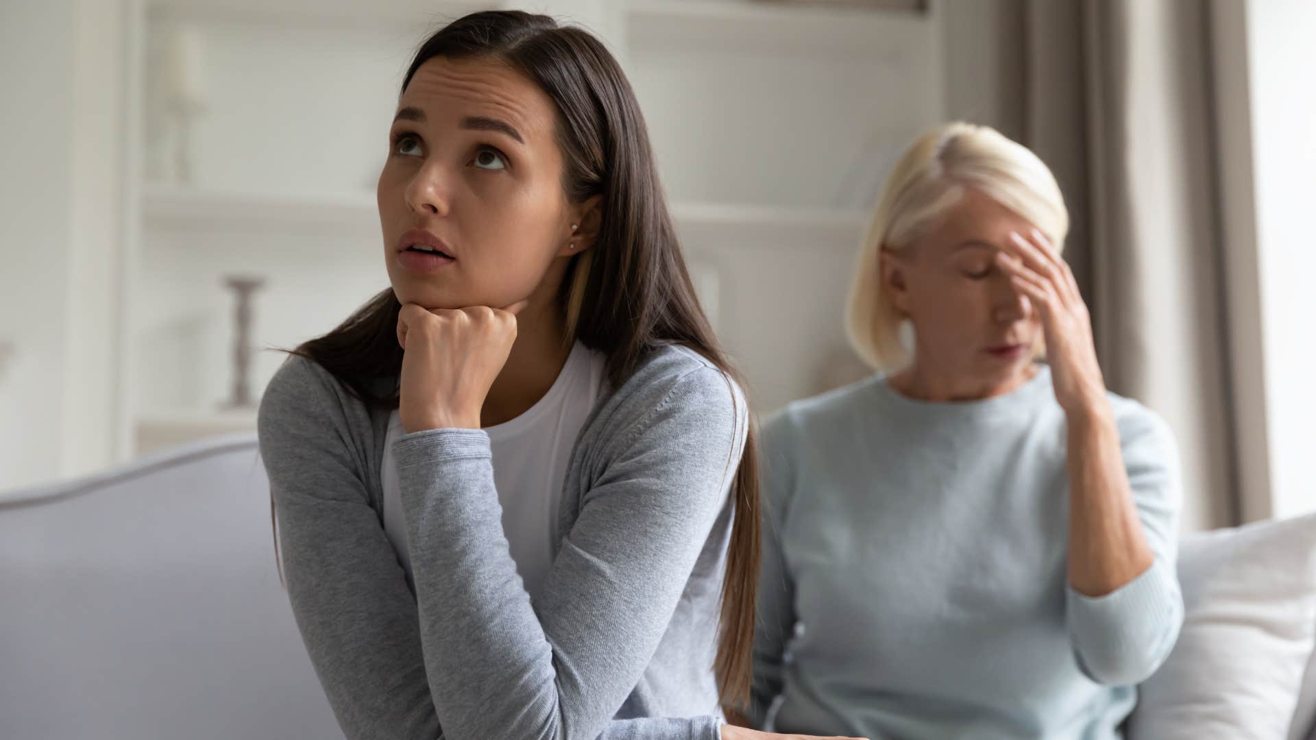 Adult daughter turned away from her mother.