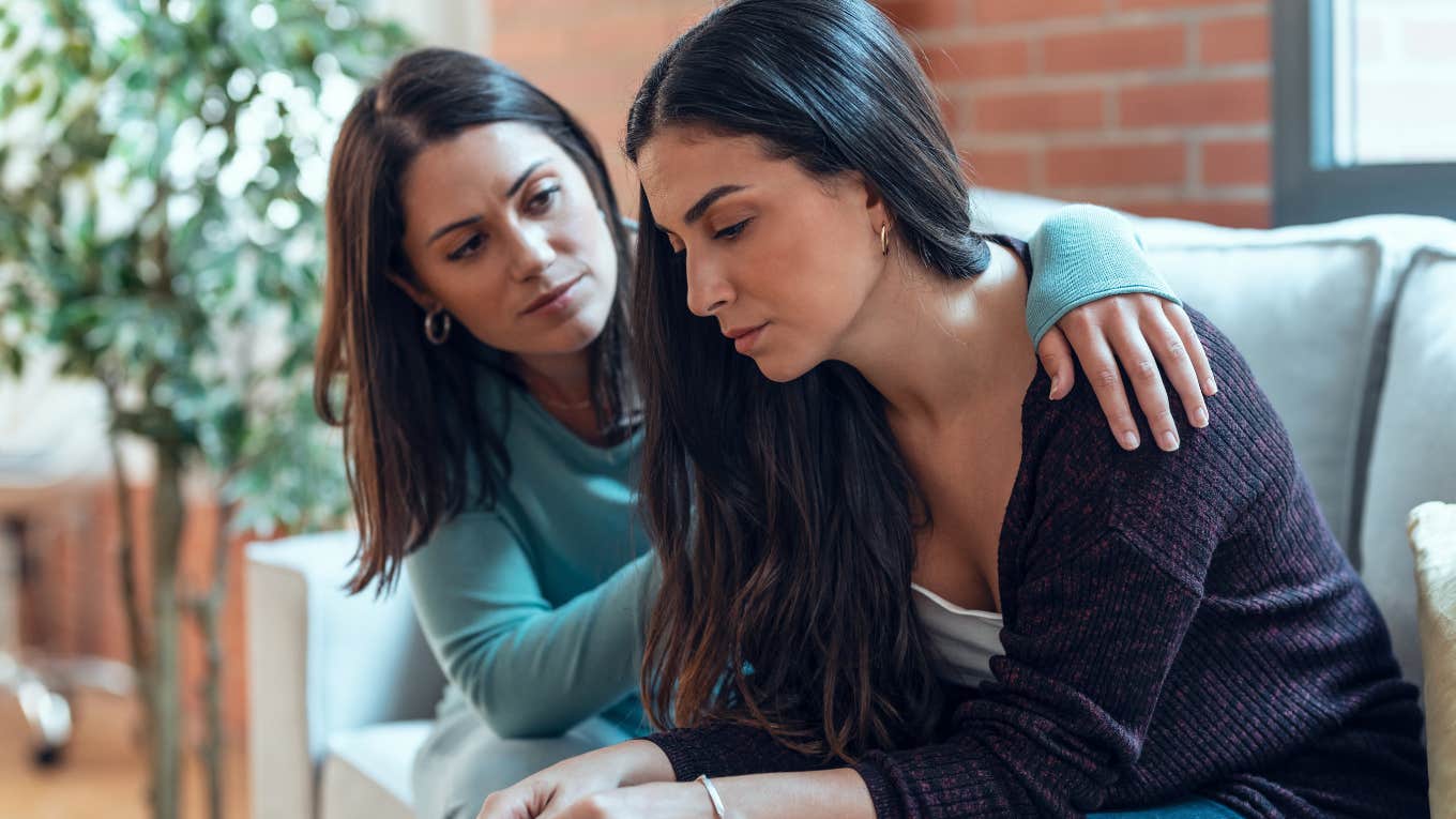 woman comforting her friend