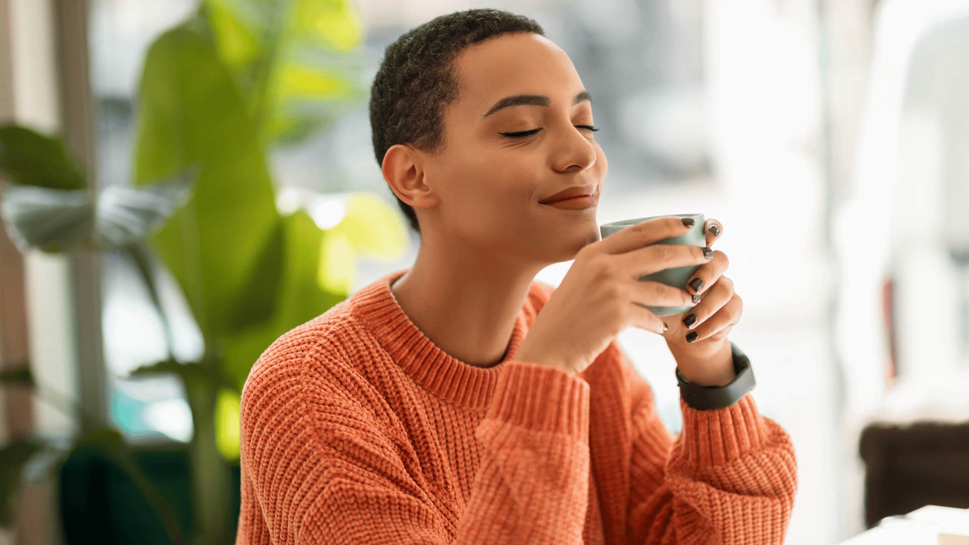 woman drinking coffee