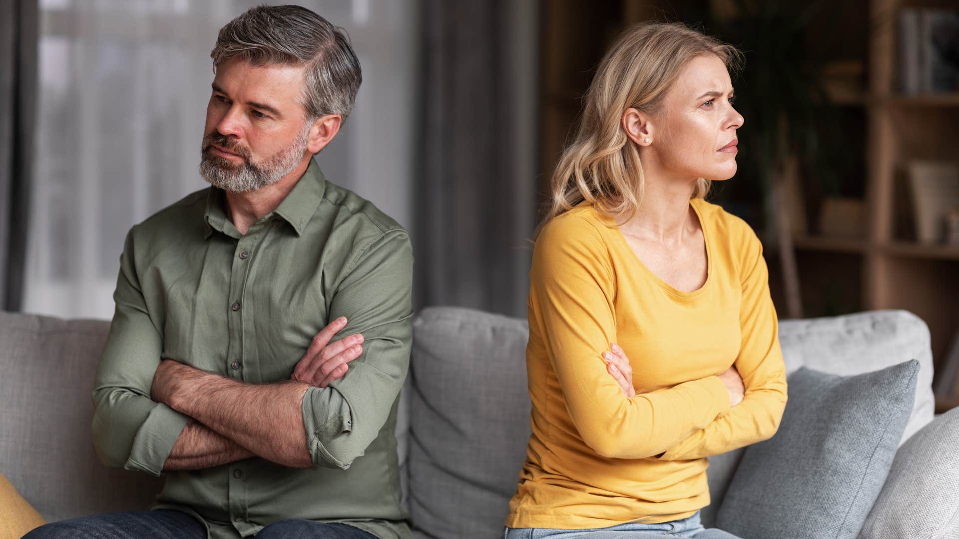 Couple turned away from each other upset.