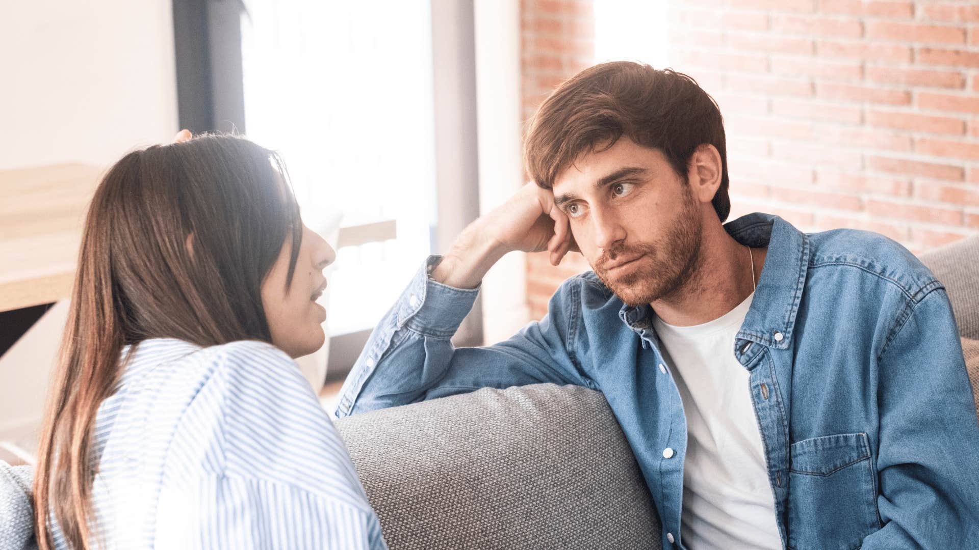 man and woman talking 