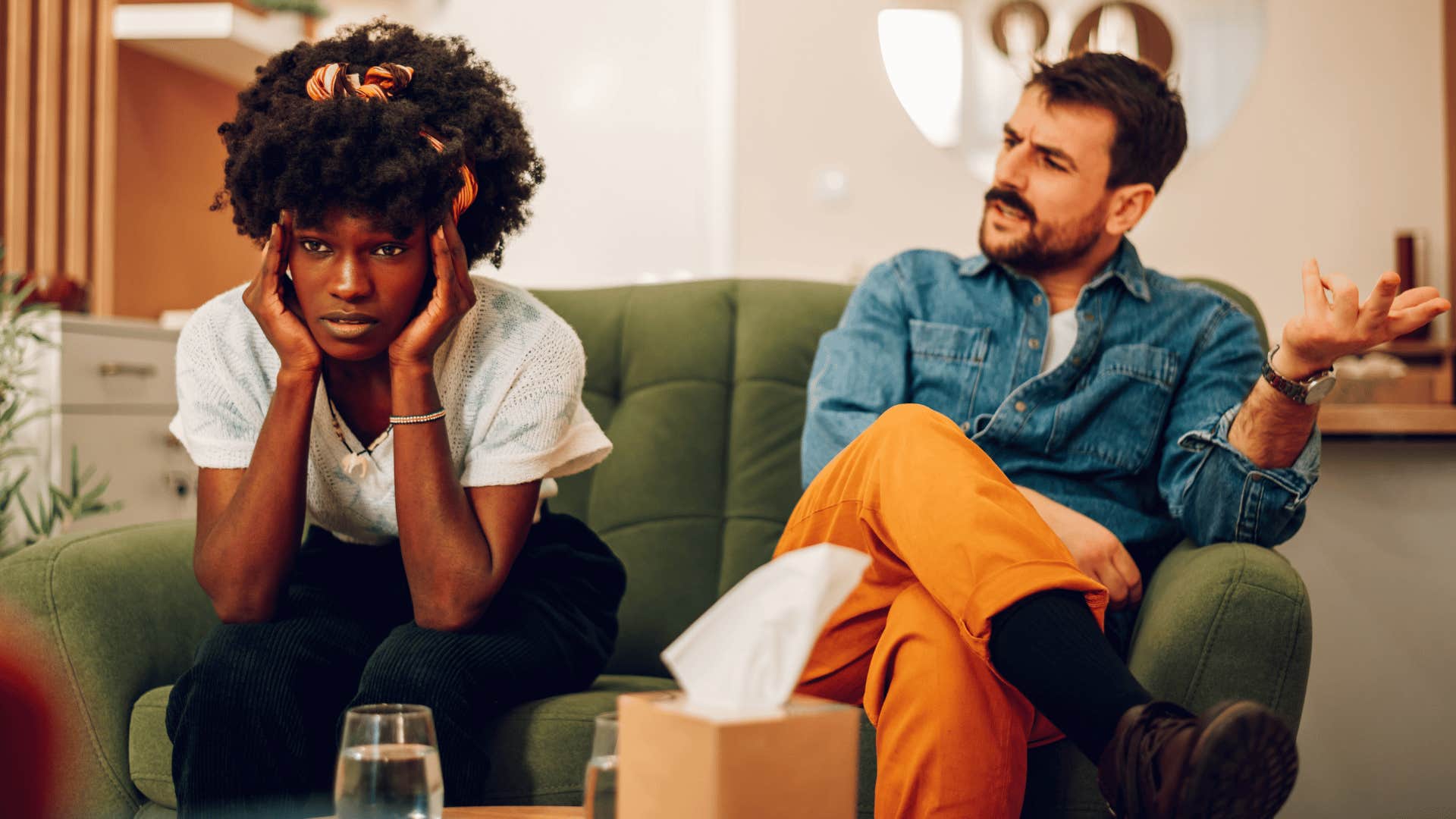 woman looking done while man keeps arguing