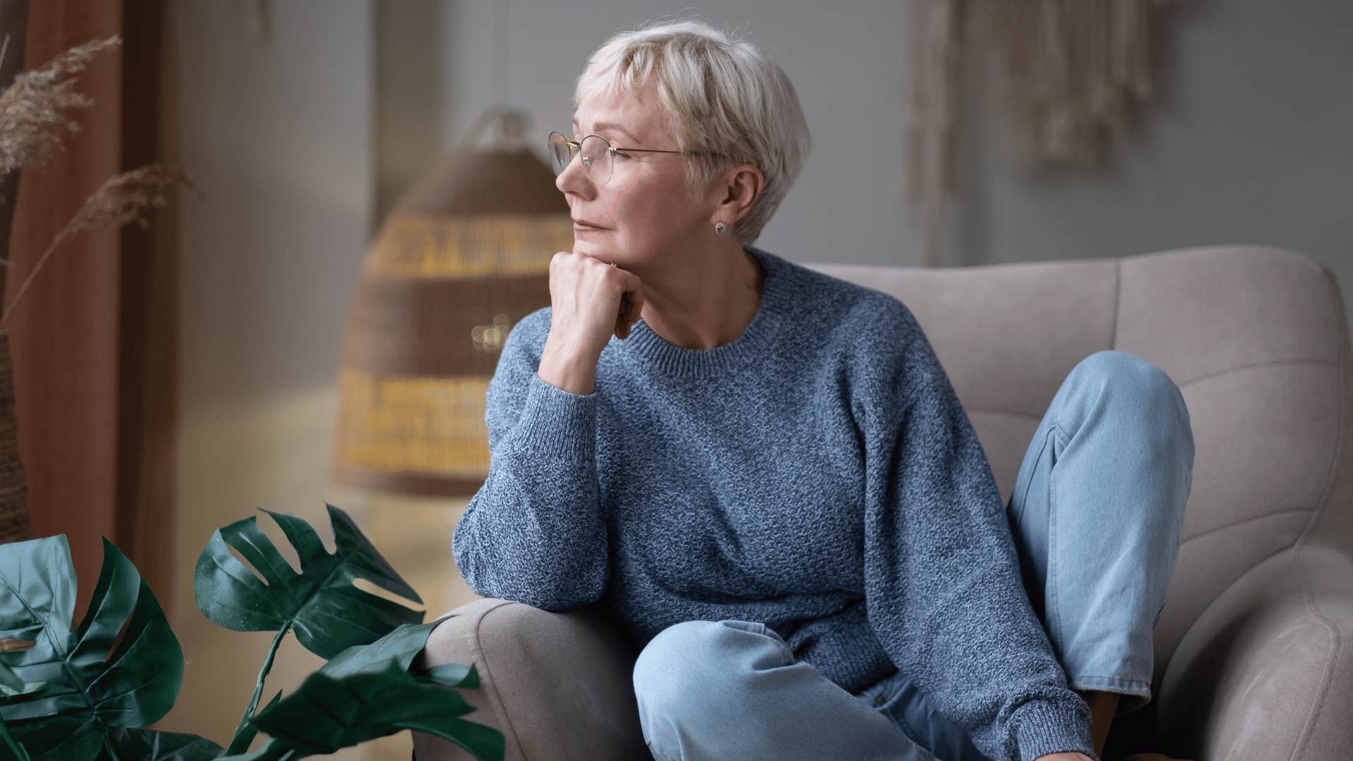 older woman sitting alone