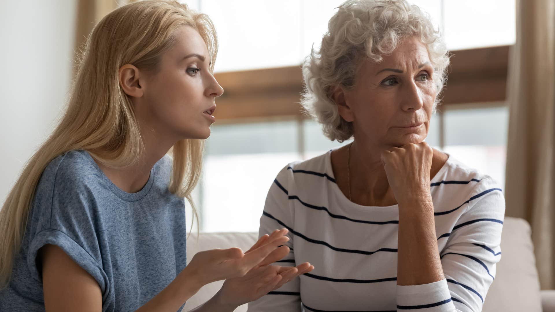 Young woman arguing with her mother. 