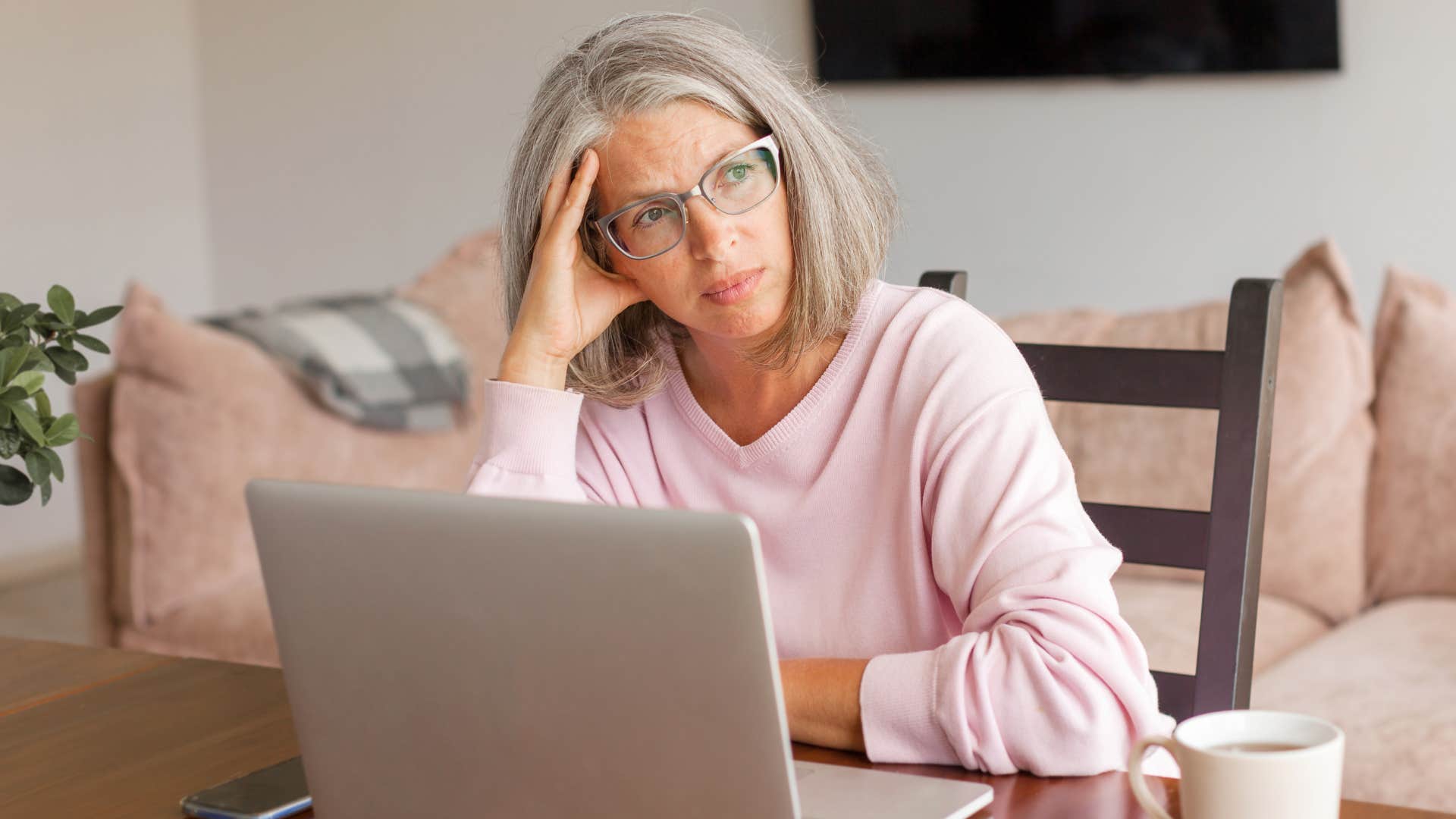 Gen X woman looking upset staring away from the camera