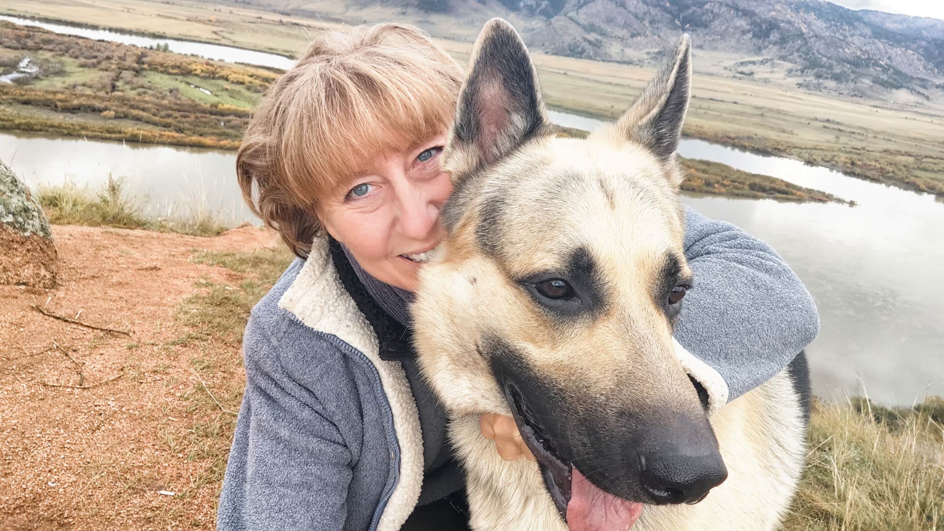 Gen X woman spending personal time hiking with her dog