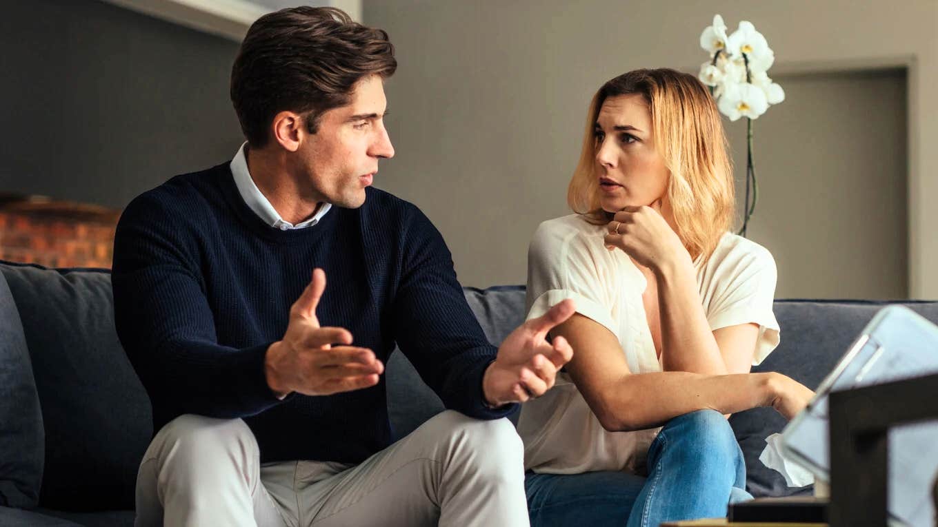 Man and woman looking at each other puzzled, not understanding each other.