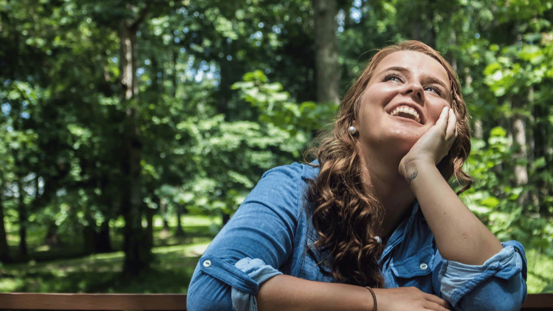 woman smiling outside