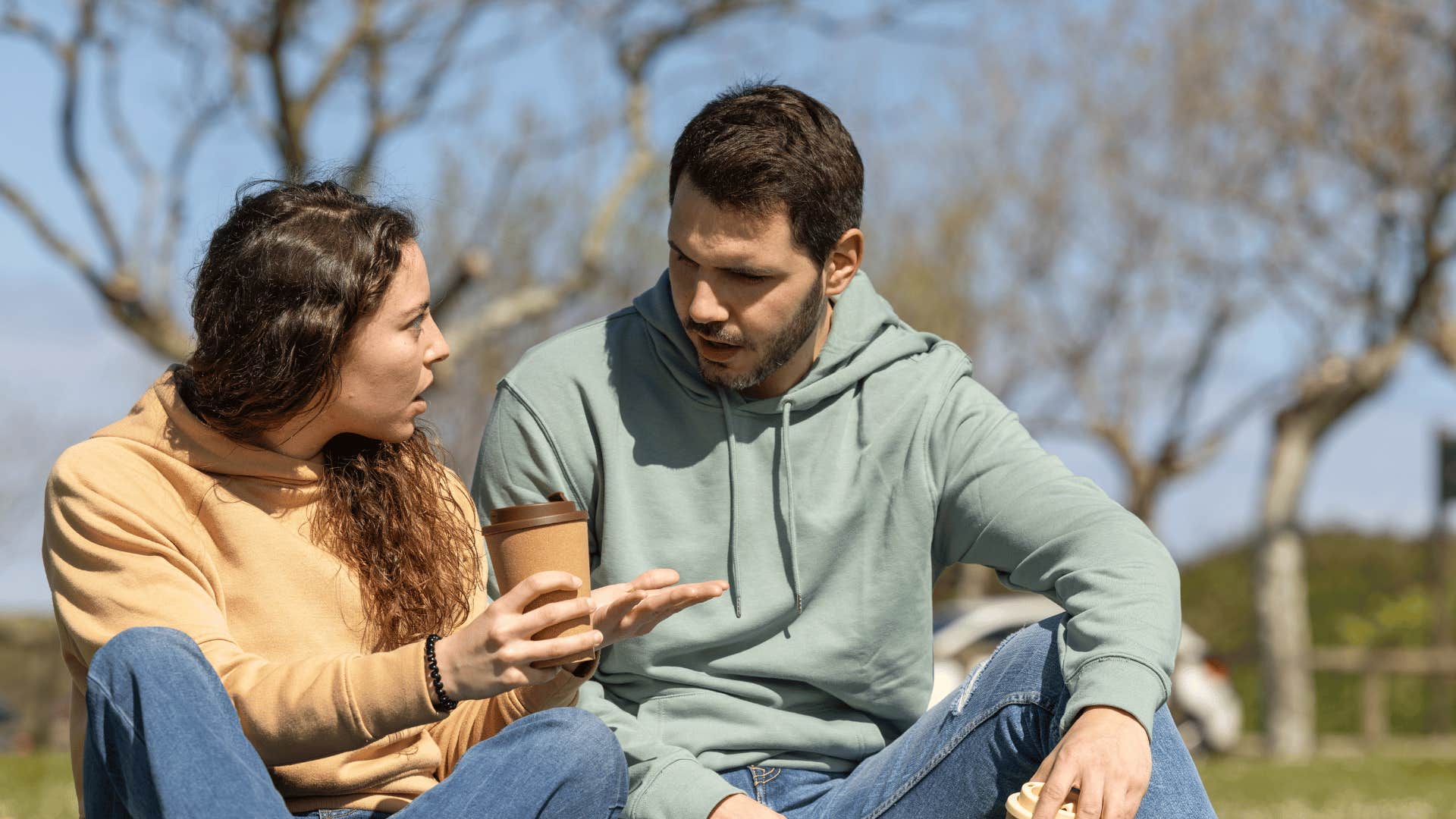 couple arguing in park