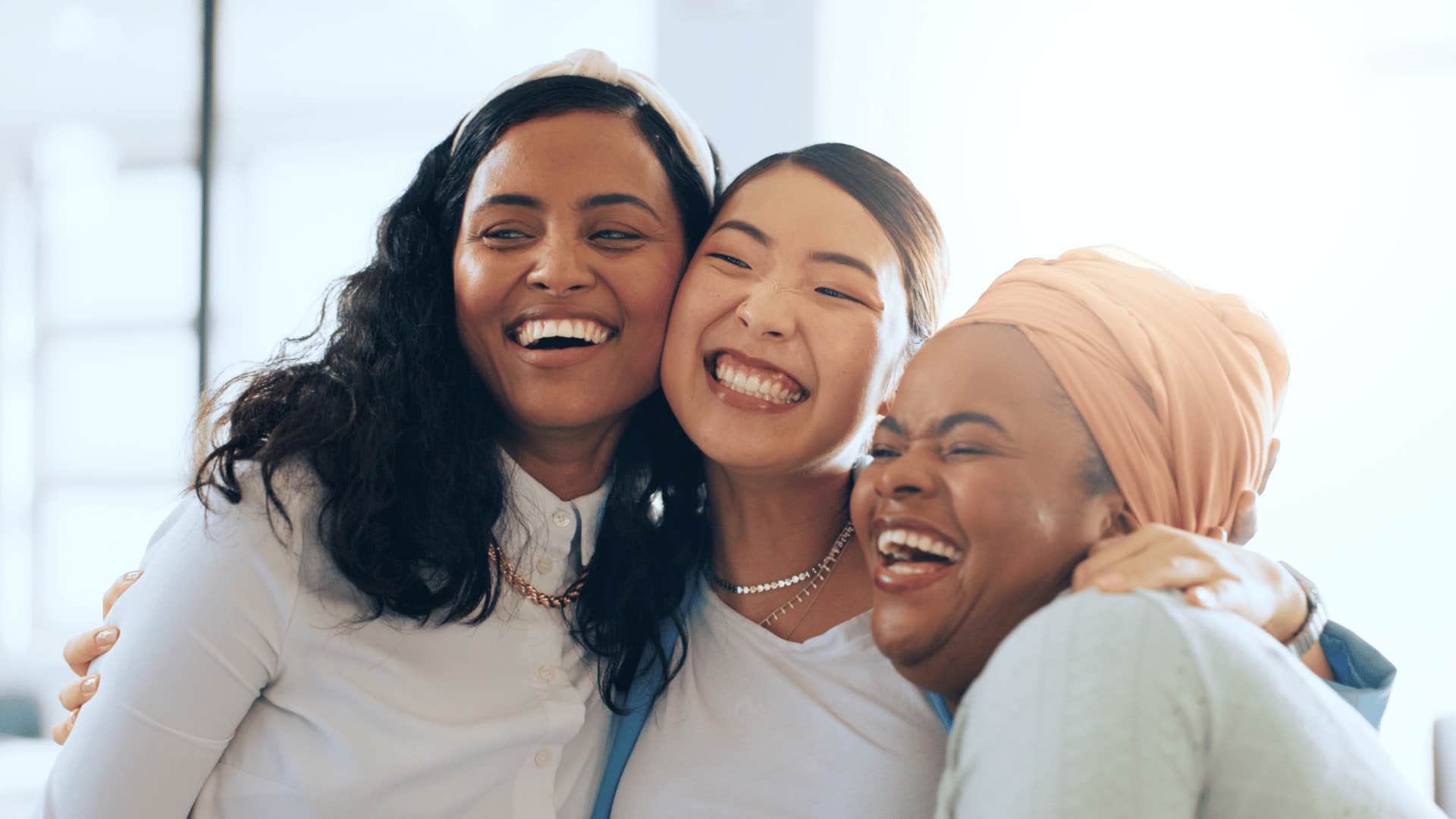 three women smiling