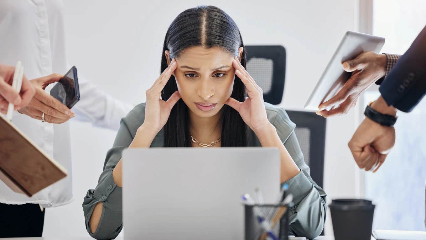 Woman who is burned out at work