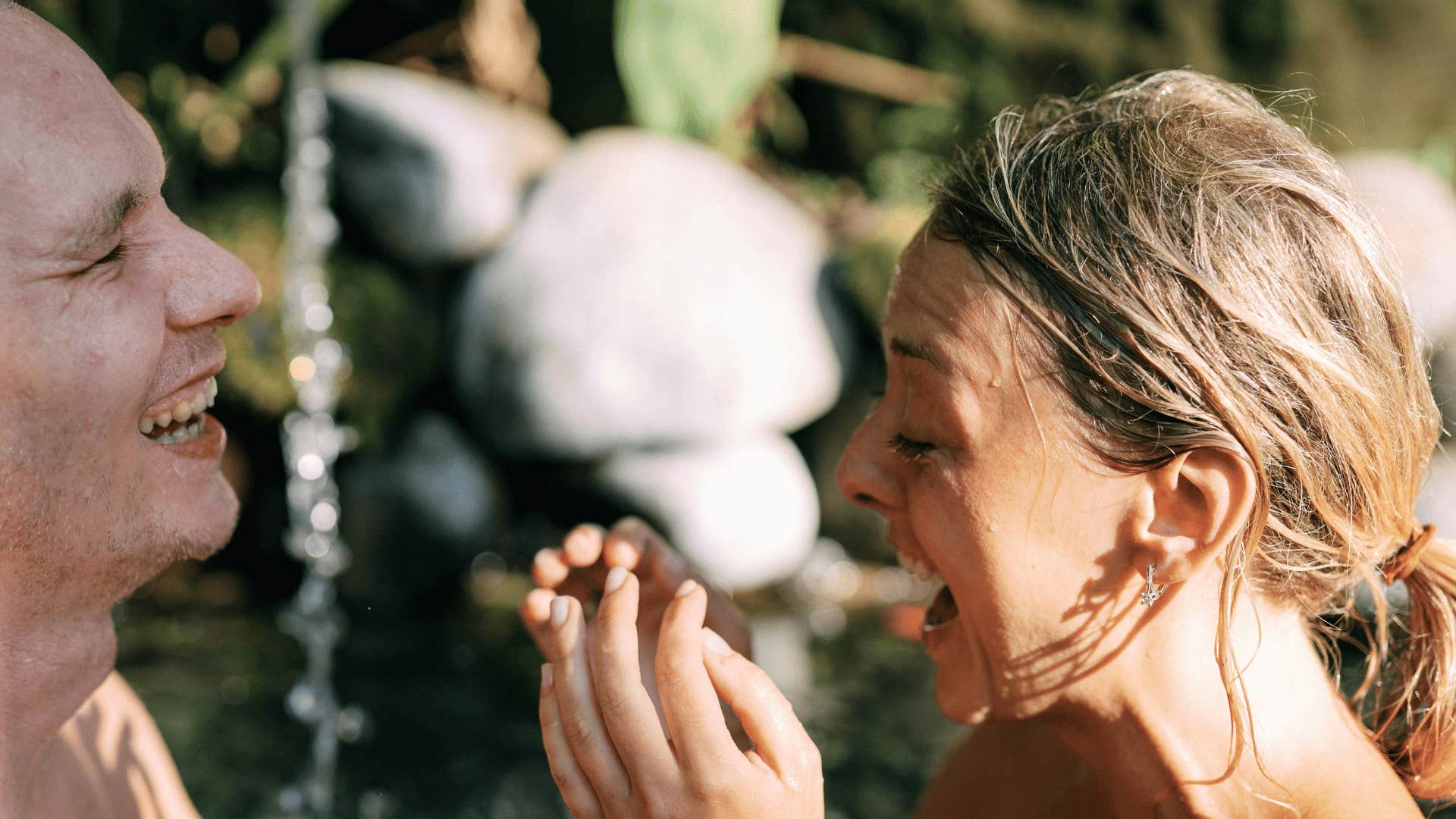 man and woman laughing