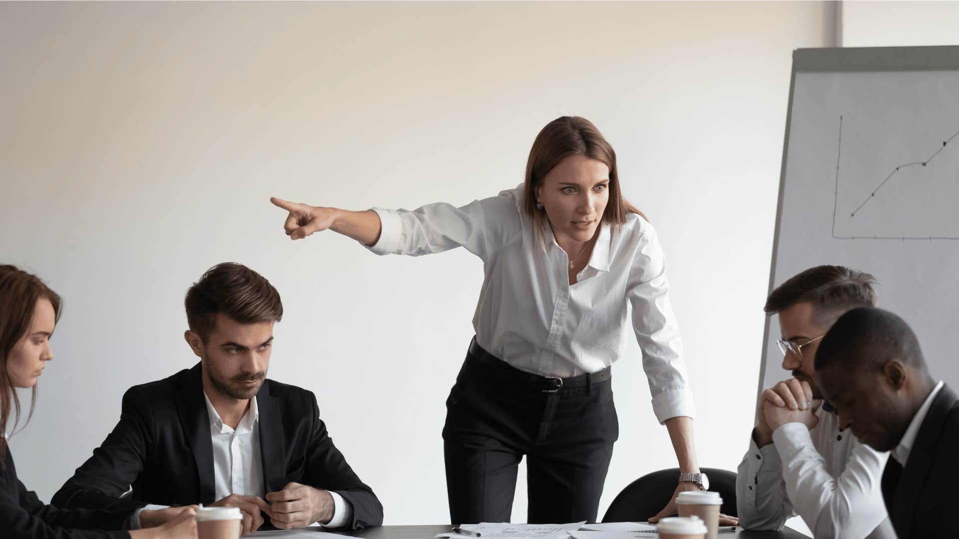 woman yelling at a group of people