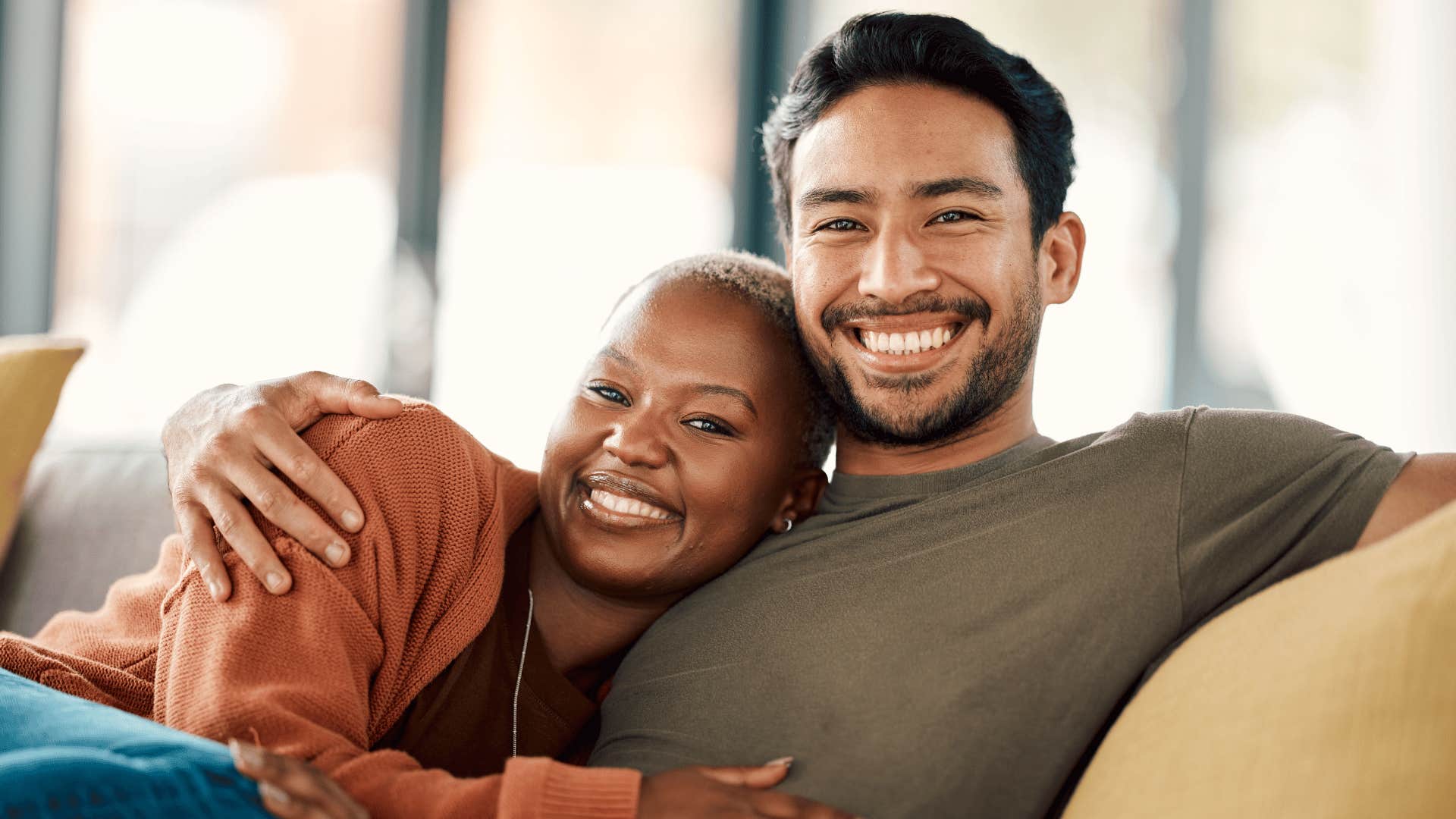 man and woman sitting together