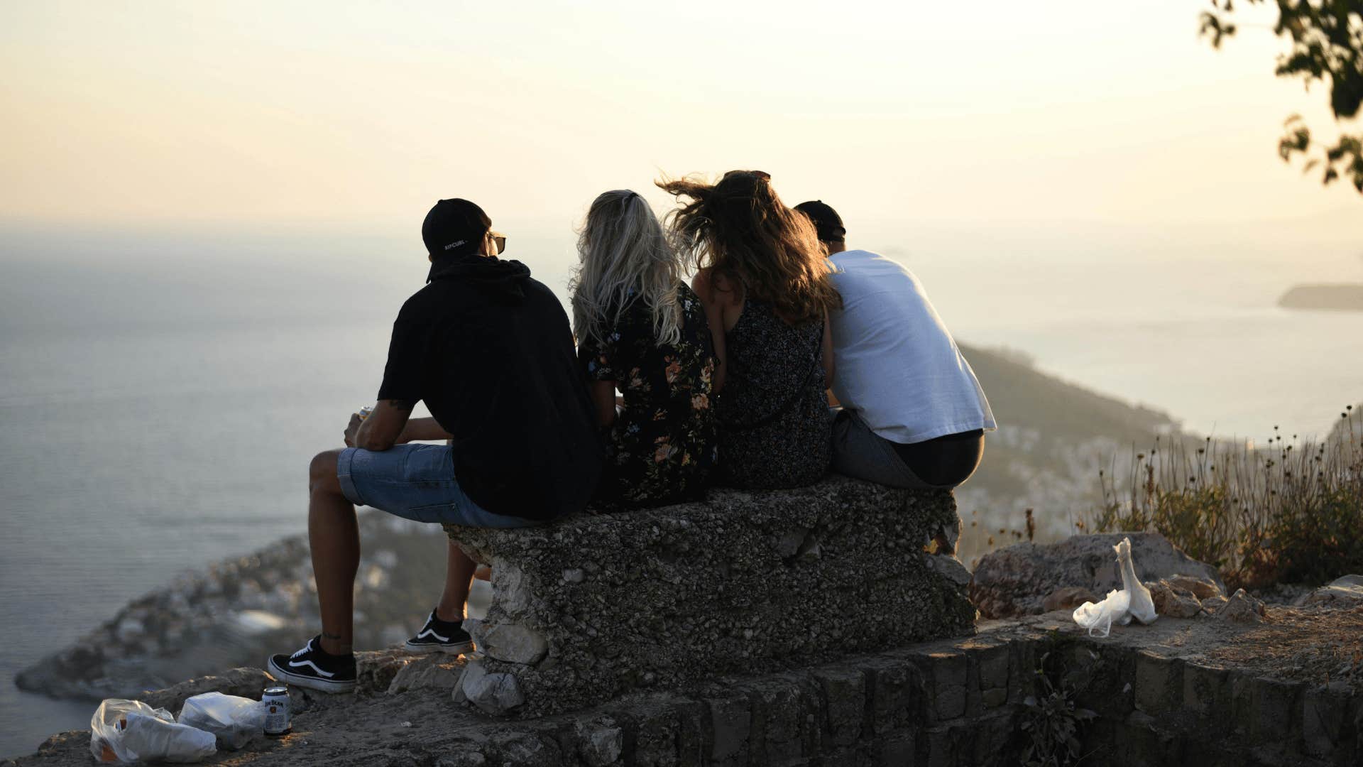 group of friends on a park bench