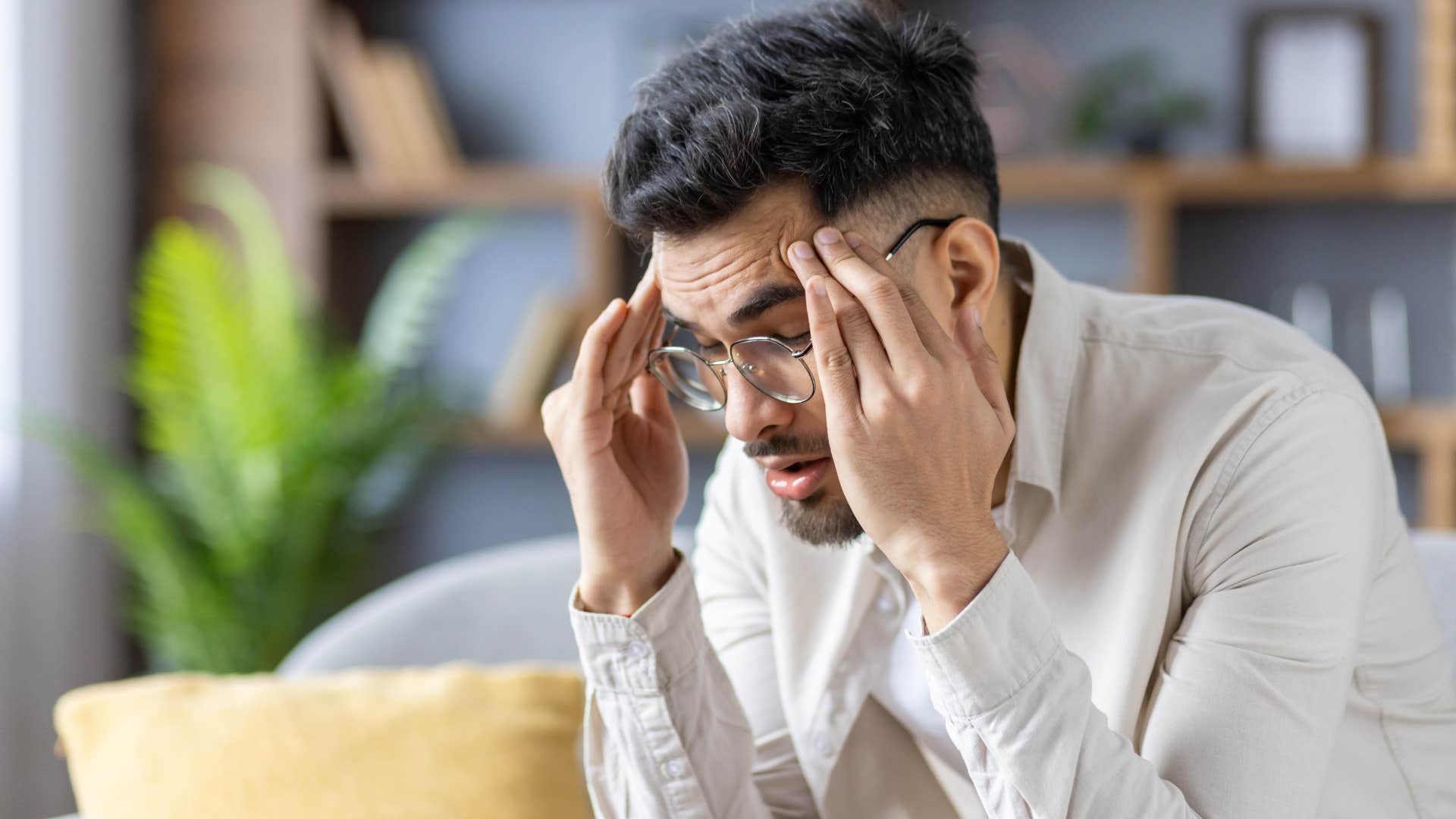 Professional man looking upset at work.