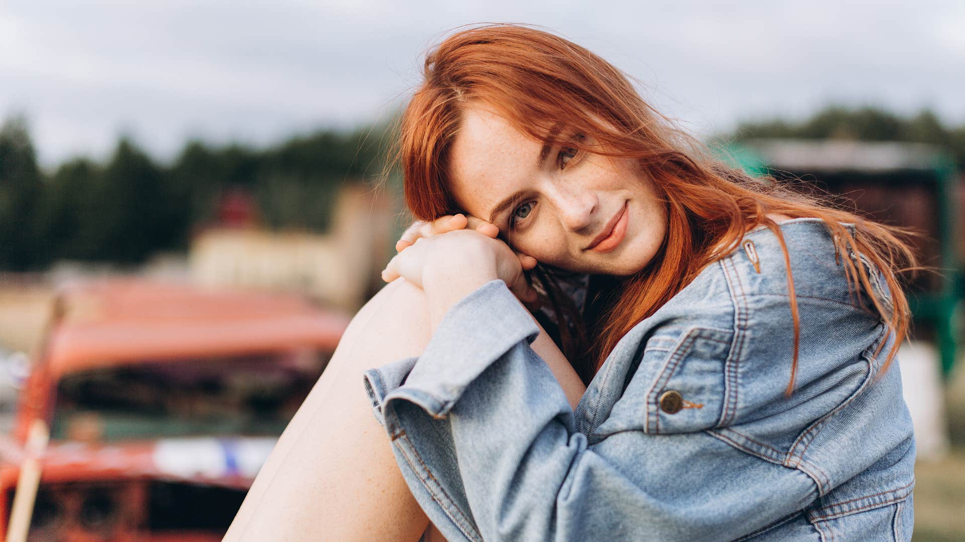 beautiful woman with freckles, red hair and fair skin