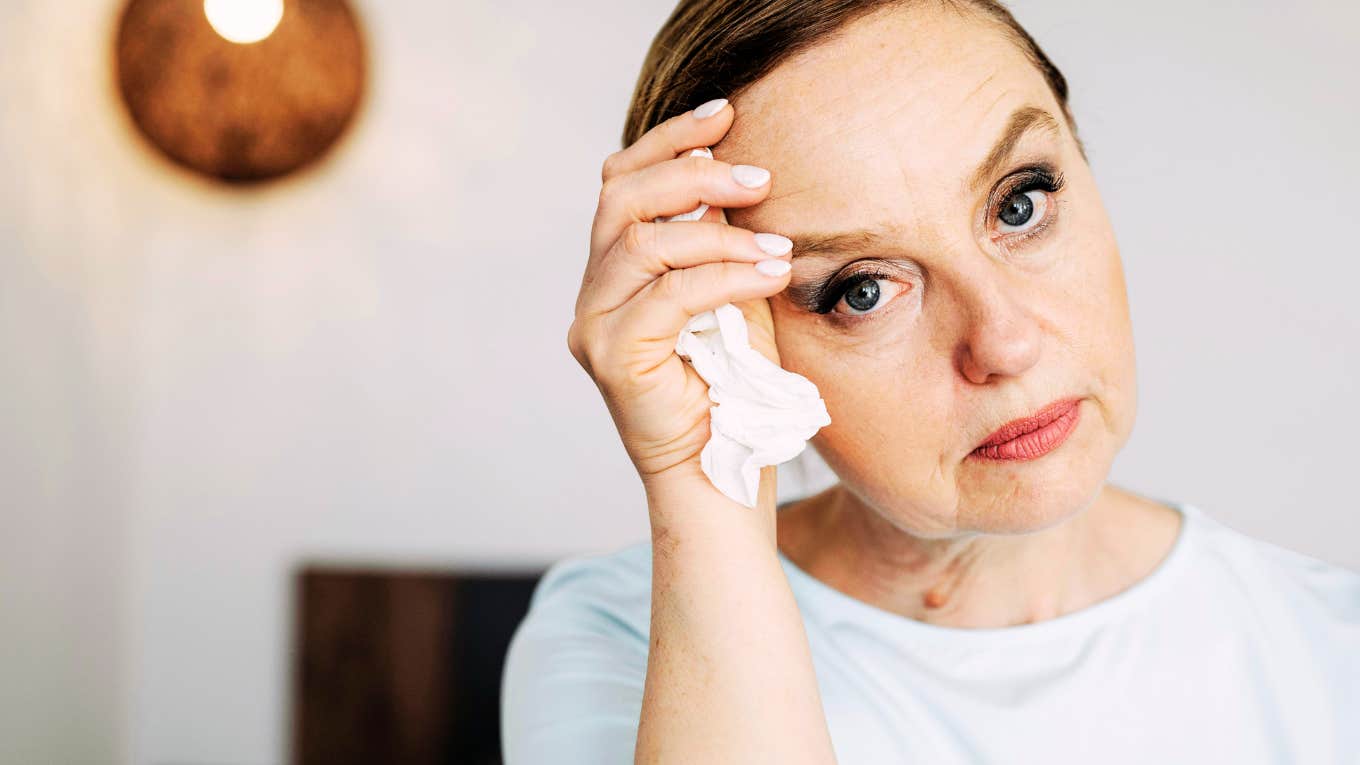 Sad female going through the stages of grief, after a divorce. 