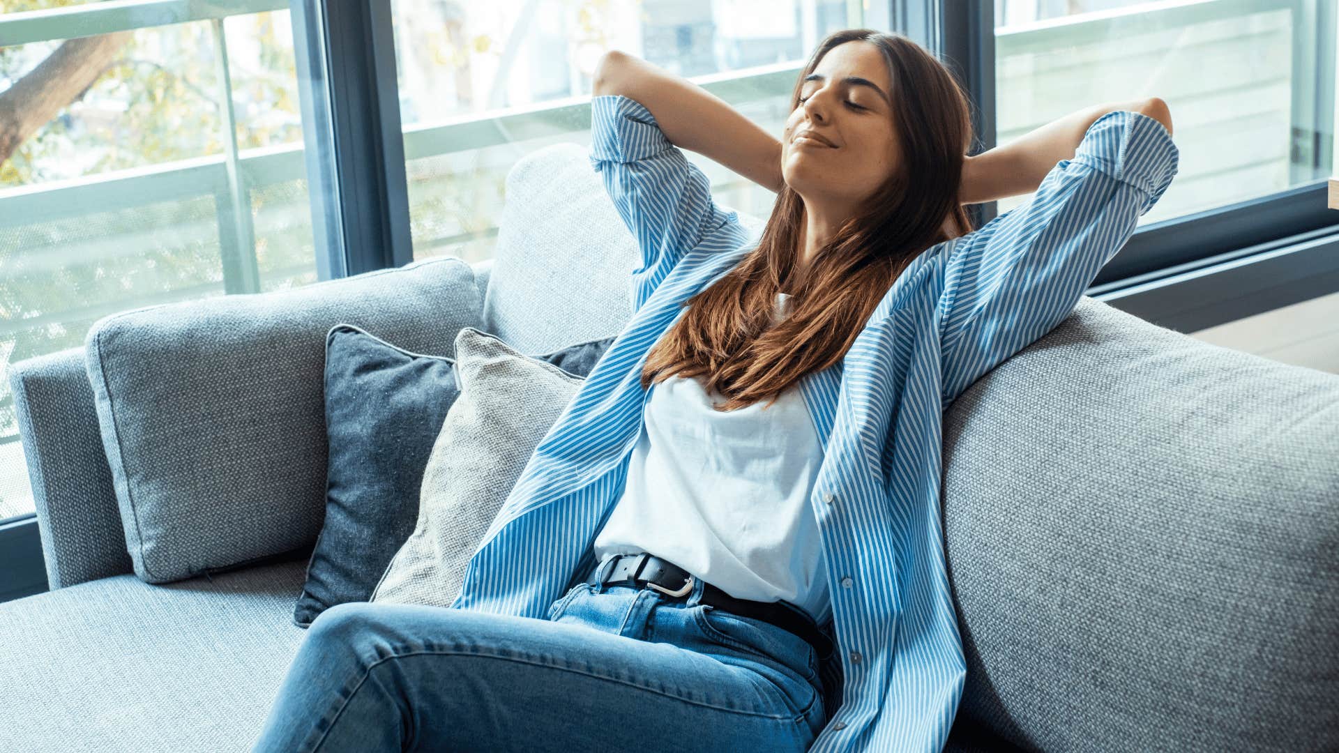 woman relaxing on couch