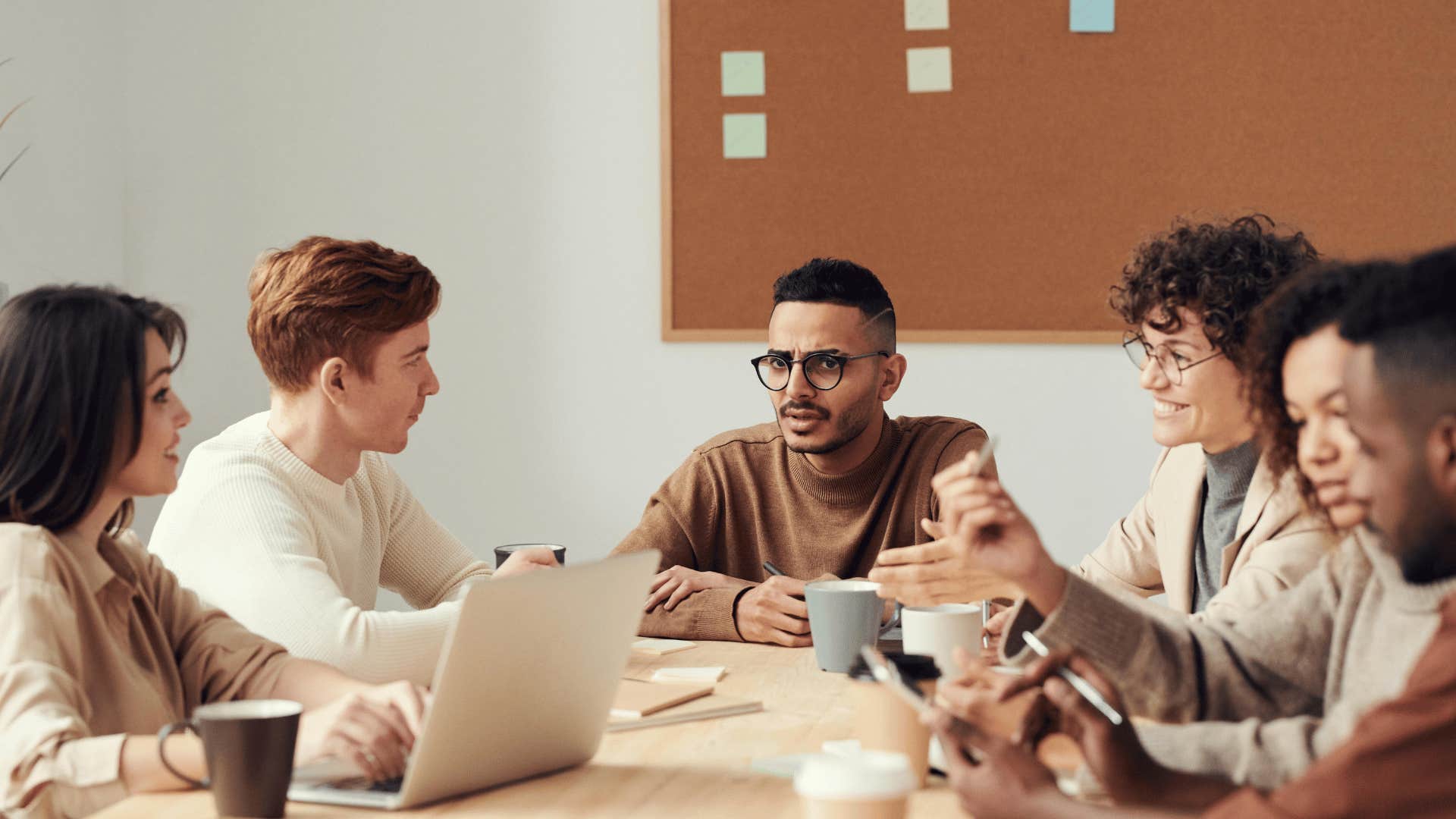 group of people sitting down and talking