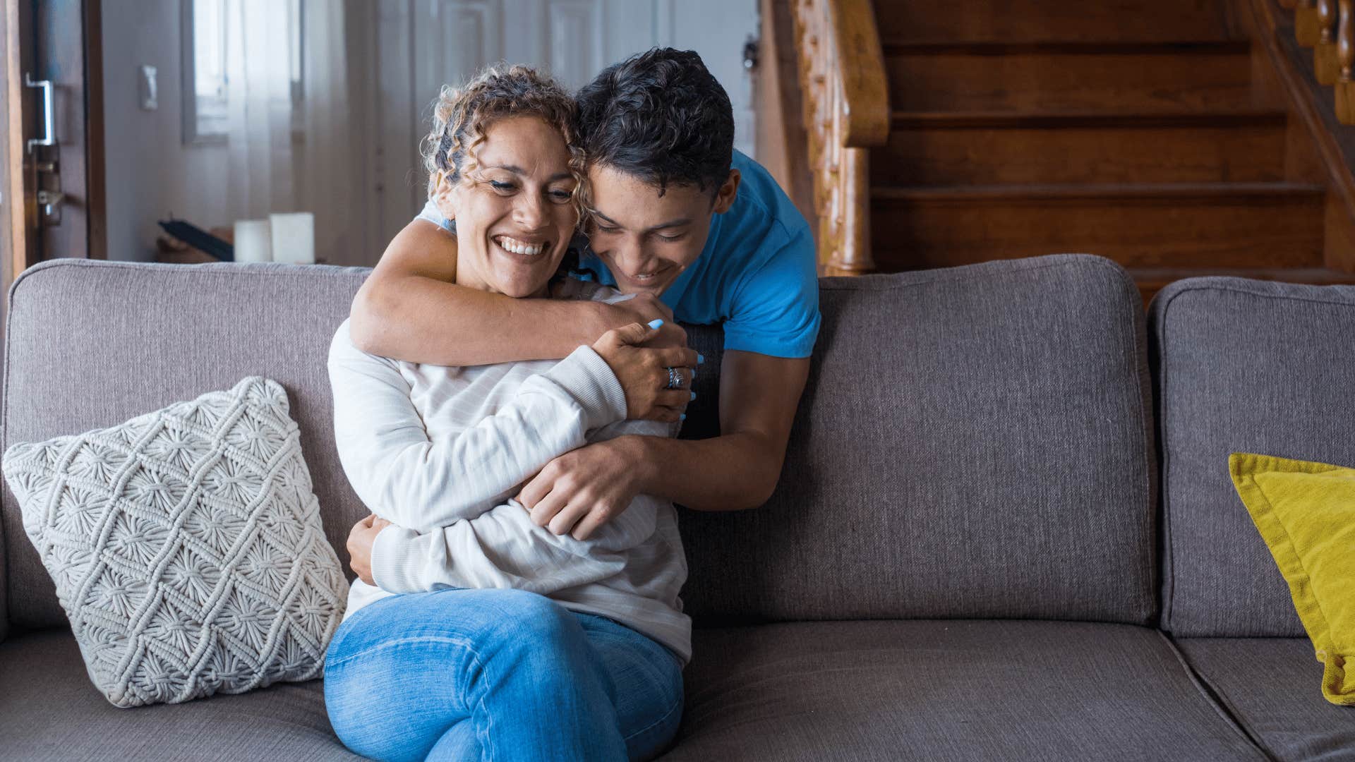 son hugging happy mom